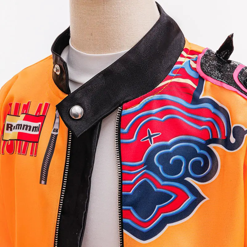 Close-up of the jacket collar, press stud and printed red and blue cloud motif