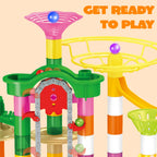 Colorful 236-piece glowing marble run with motorized elevator by For Full Fun, featuring vibrant marbles and intricate track design.