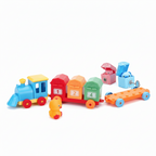 Child playing with colorful toy train set on a white background